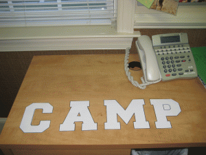 The first step in making your banner is to print a font you like on paper and blow it up to actual size - then cut out the letters.