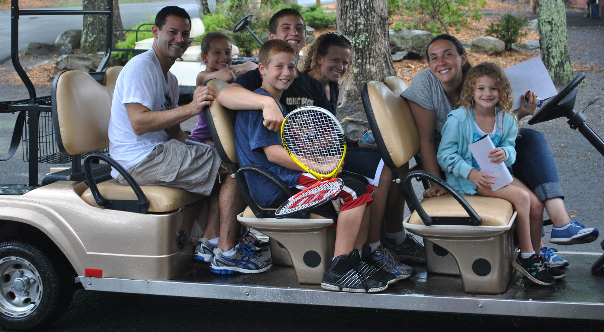 Image of happy campers taking tour of Camp Canadensis