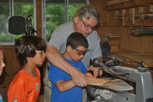 Image of kids in woodshop as a summer camp activity at Camp Canadensis.