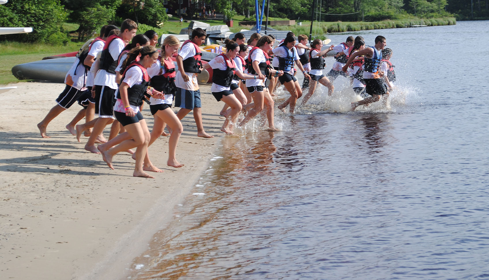 Image of Girls Running Into the Lake