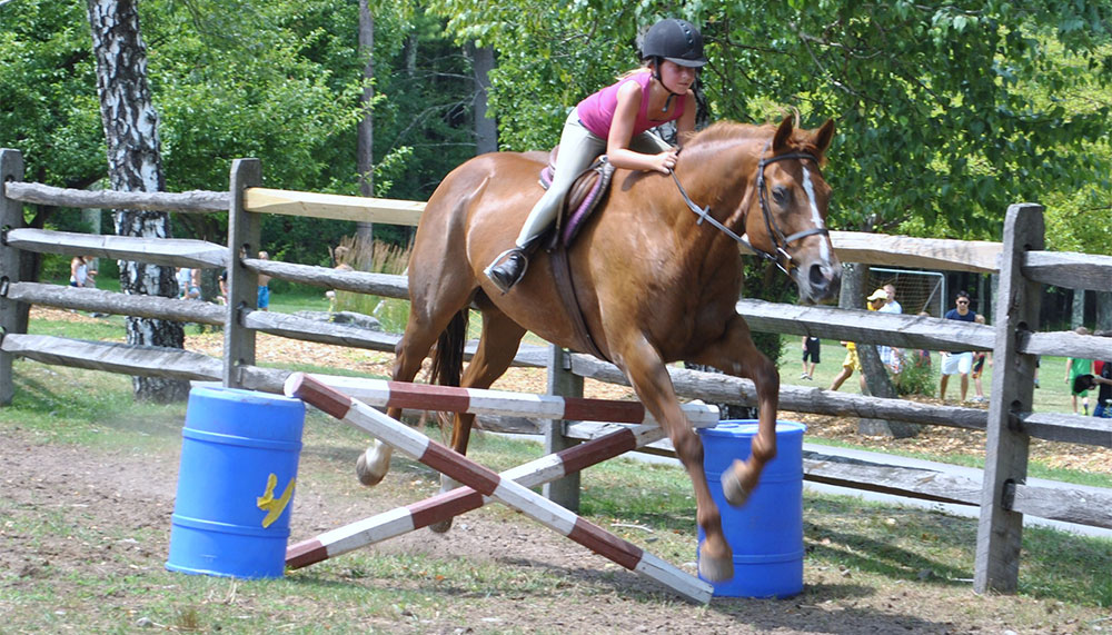 Image of girl horseback riding at the best summer camp in the Poconos – Canadensis