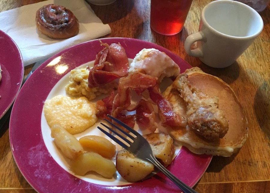 This is what a Southern Breakfast looks like at a place called Monell's.  You don't order.  They just bring you big plates of food, including eggs, pancakes, biscuits, fried apples, bacon, sausage, country ham, cheesy grits, fried chicken and cinnamon rolls.  It was fantastic! 