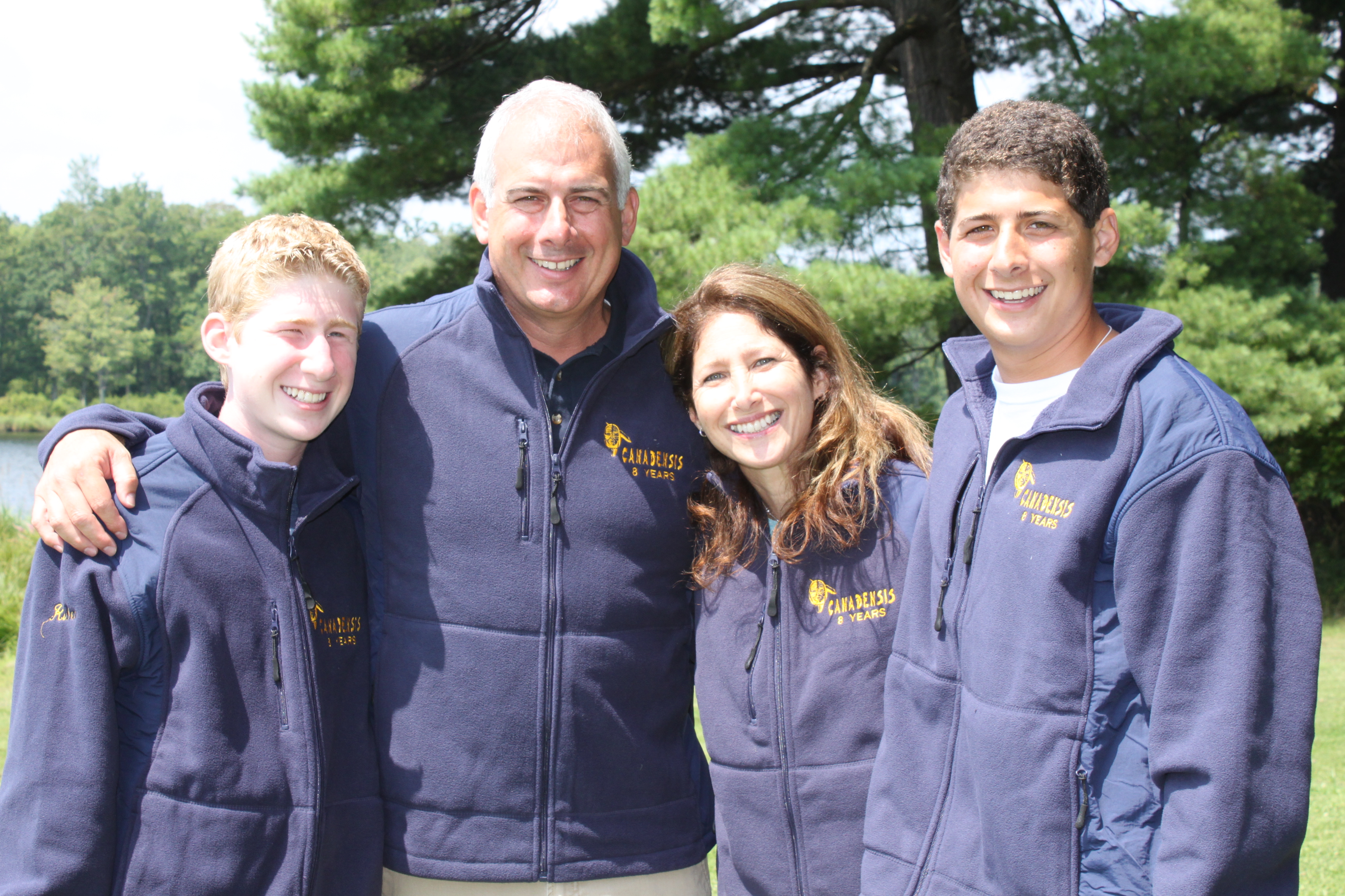 Ken with Audrey, Dan and Greg.  All four received their 8-year jackets in Summer '09.  Thanks for everything Ken!