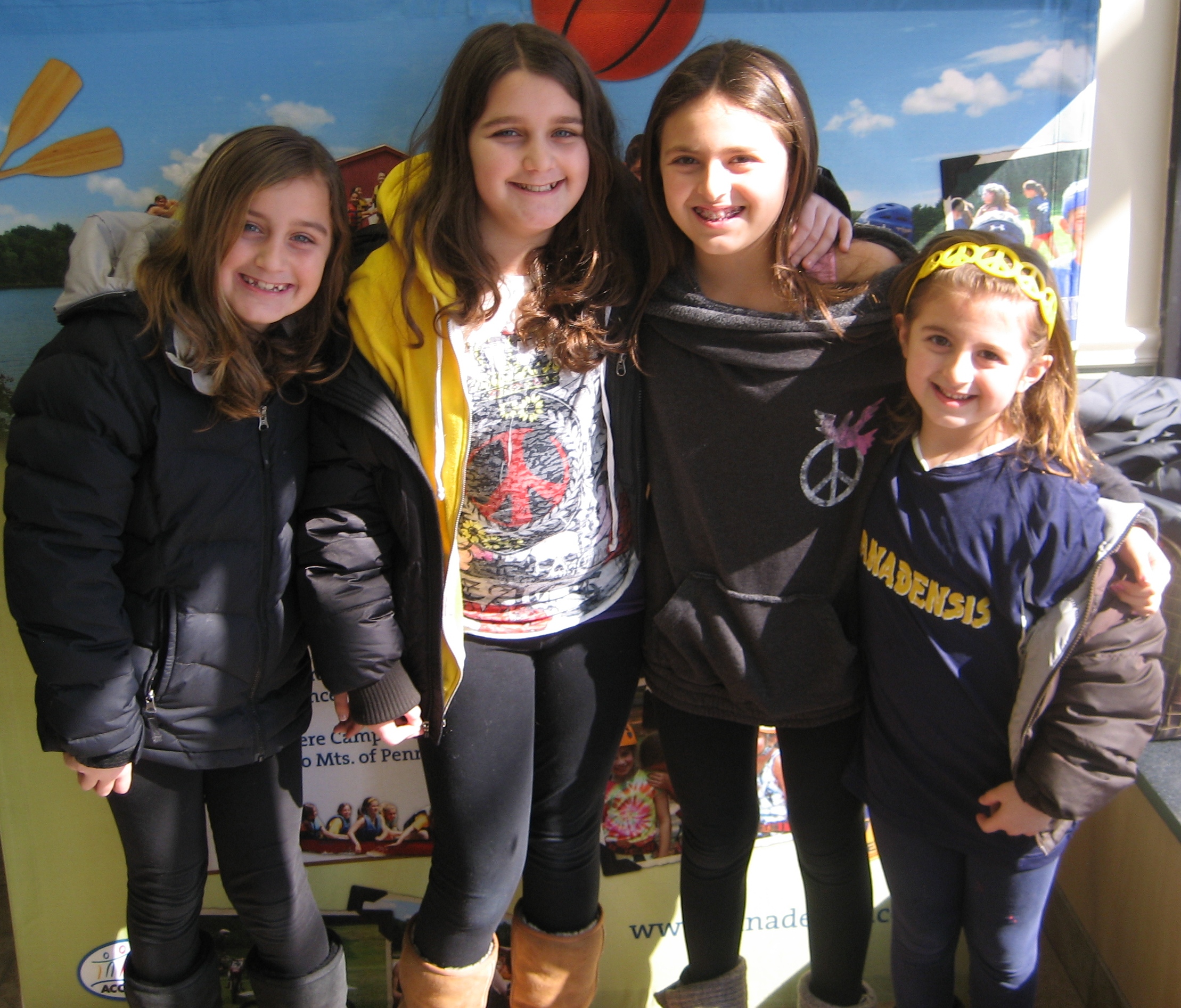 Campers Lindsay Reiter and Ali Beyda with younger sisters and future campers Carly and Caitlin.  