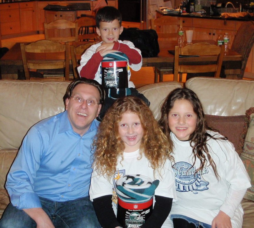 Me with Hannah and Daniella Schreiber (and their younger brother Zachary).  Notice they are holding their Philadelphia Eagles blankets.  I think they were trying to stick it to me!  Ha Ha!