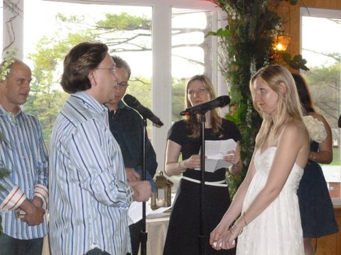Me and Jaime exchanging our own vows.  Our siblings, Michael and Harlee, officiating the wedding.