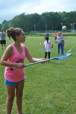 Dara practices her stick work at the Evolution Lacrosse clinic.