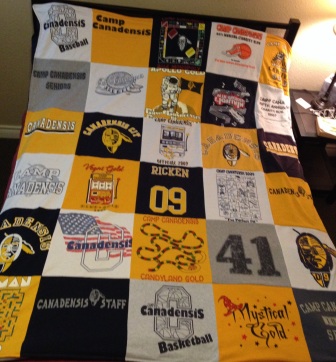 Former camper and recent staff member Greg Ricken shared with us a surprise gift he received recently in which all of his past camp t-shirts were turned into a blanket!  So cool!  