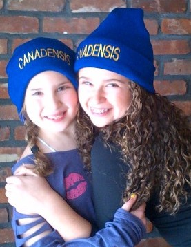 Ava and Marlee Krasin are keeping warm and are in camp spirit wearing their new Candensis hats.  